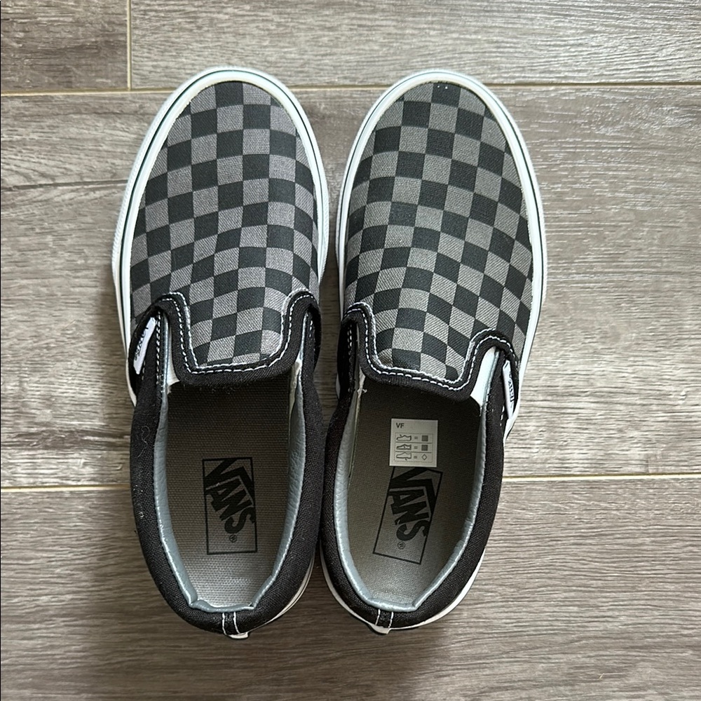 Vans Black and Gray Slip-On Sneakers with Checkerboard Pattern